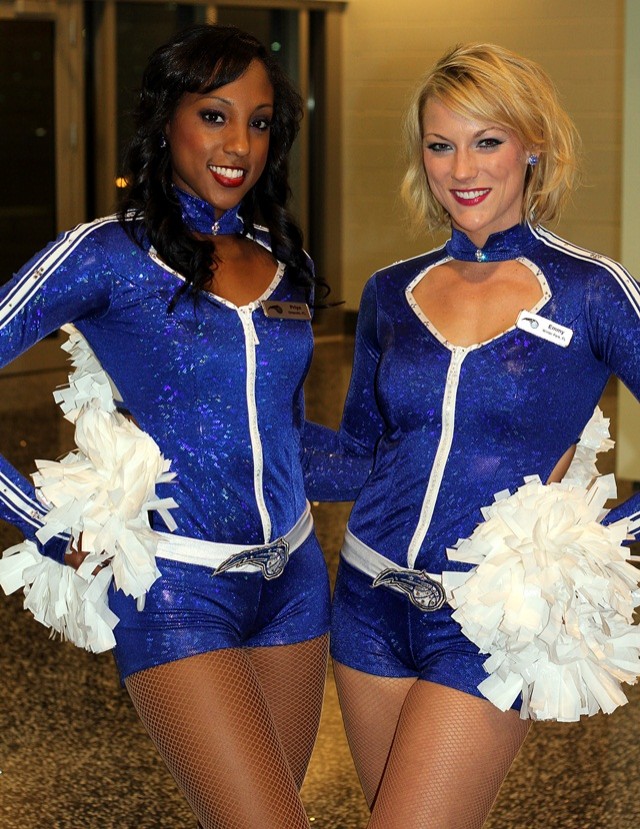 Priya and Emmy greet fans in the upper concourse before tip-off