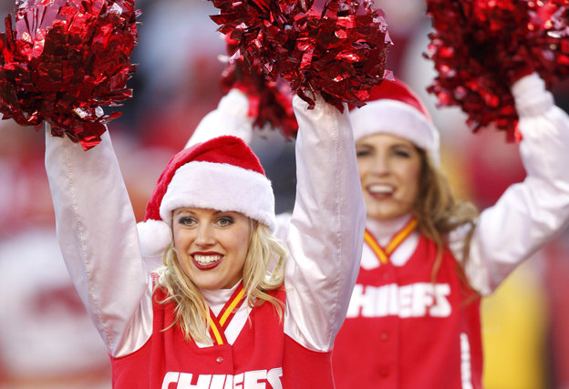 NFL cheerleaders bring the Christmas spirit as they dress in sexy