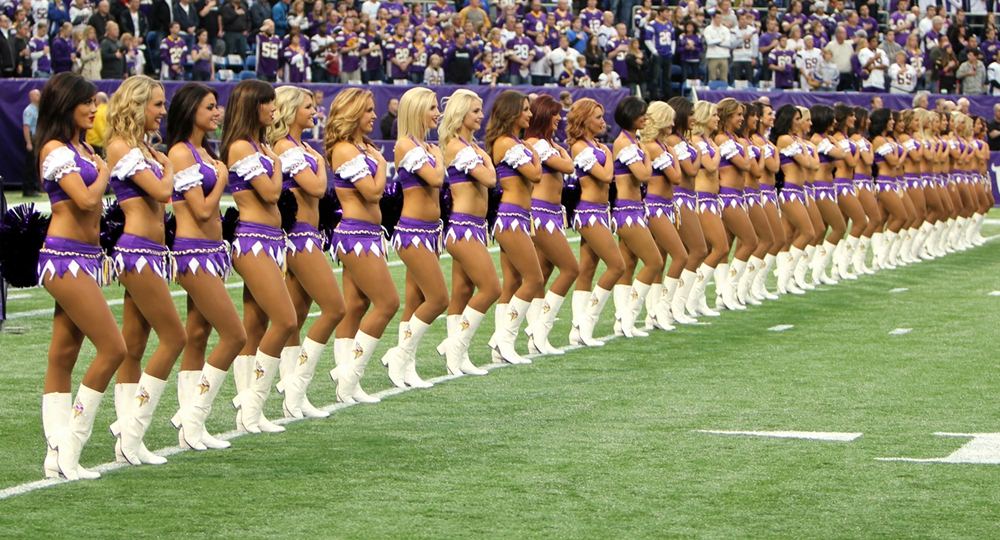 The Minnesota Vikings cheerleaders perform on stage, - NARA