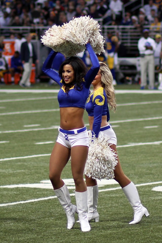 Dallas Cowboys cheerleader performs at halftime in her Santa Claus