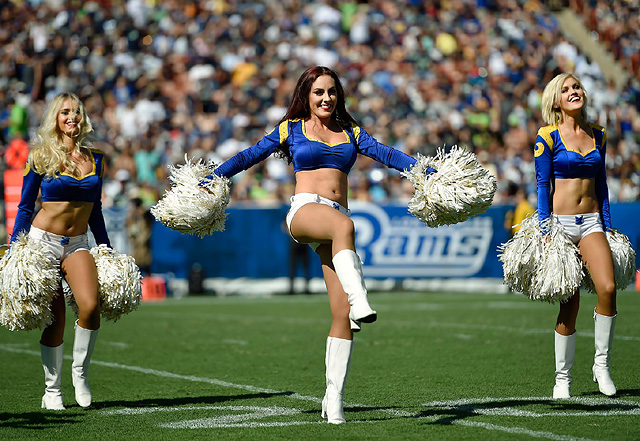 Members of the Los Angeles Rams cheerleader team perform during the second half of an NFL football game between the Rams and the Seattle Seahawks at the Los Angeles Memorial Coliseum, Sunday, Sept. 18, 2016, in Los Angeles. (AP Photo/Kelvin Kuo)