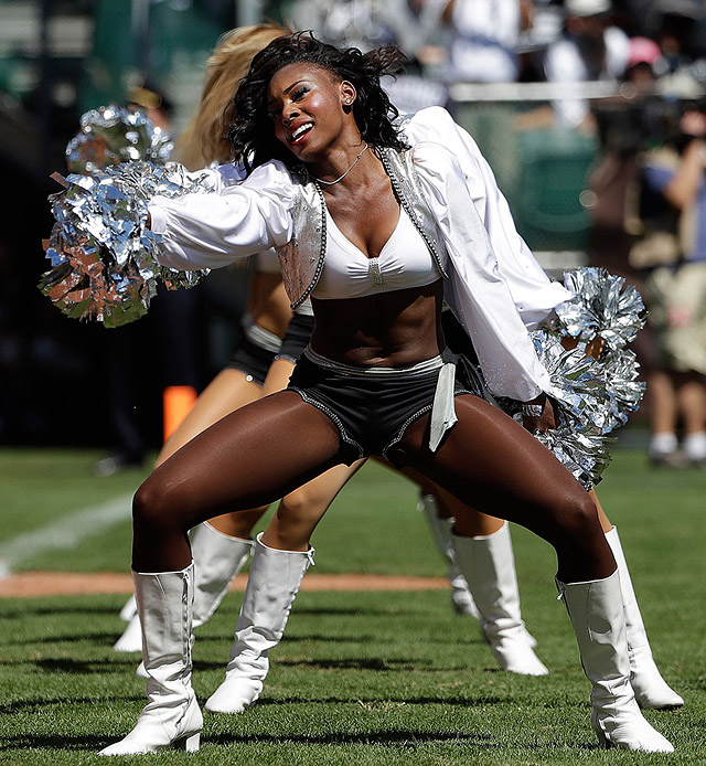 Oakland Raiders cheerleaders perform during the first half of an NFL  football game between the …