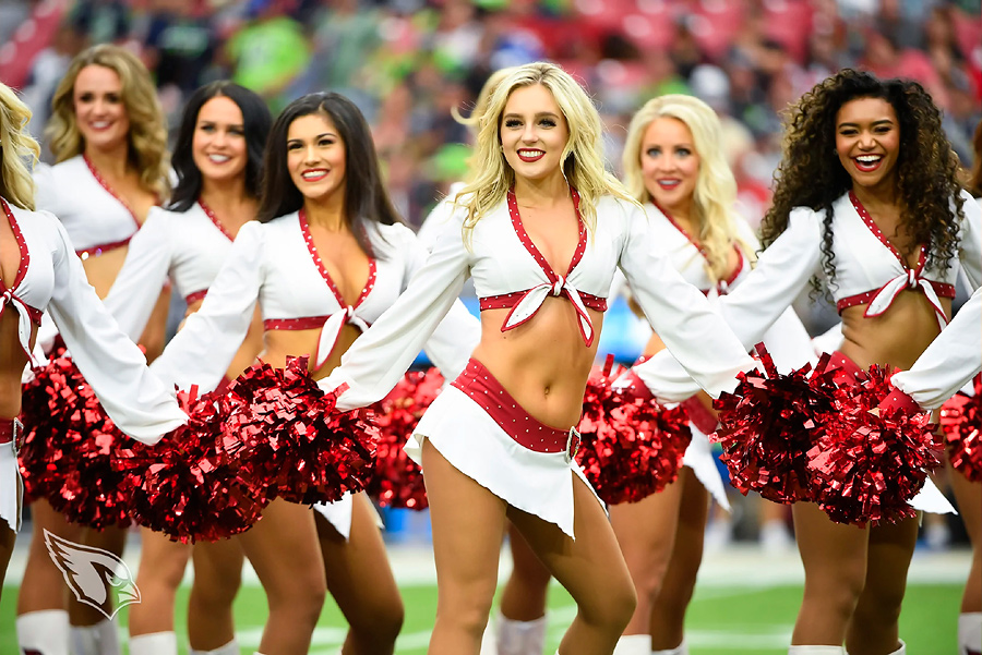 A Arizona Cardinals cheerleader performs against the Arizona